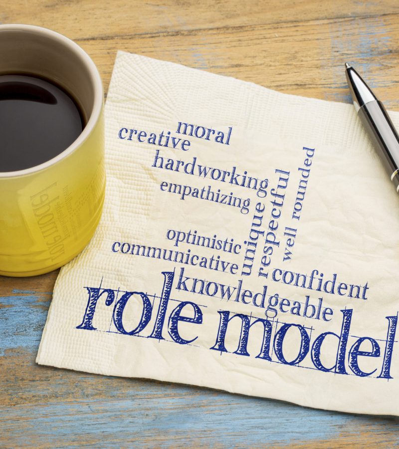 role model qualities role model qualities word cloud -handwriting on a napkin with a cup of coffee